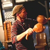 Photo of Brendan Taaffe with a fiddle - Photo copyright Maurice Gunning