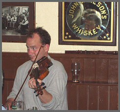 Photo of Brendan Taaffe playing the fiddle - Photo credit: Padraic Taaffe