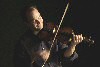 Photo of Brendan Taaffe with a fiddle - Photo copyright Maurice Gunning